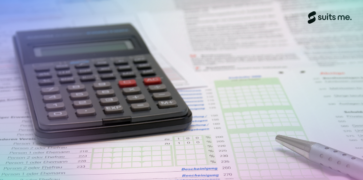 calculator on paper looking at the recurring payments