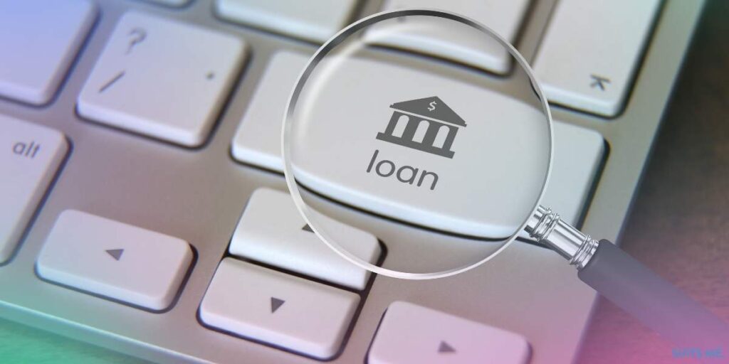 Shift Key on Laptop Keyboard replaced by the word bank loan, with a magnifying glass representing how easy it is to get a bank loan online