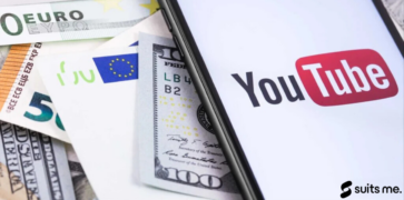 dollars, euro banknotes and YouTube logo on the screen smartphone. Representing Finance YouTube channels who make content about money.